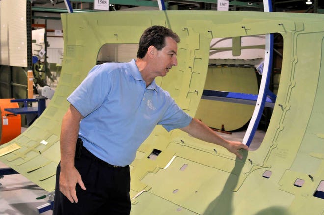 Photos by Steve Bisson/Savannah Morning News Phil Lajeunesse, general manager of LMI, shows how his company assembles parts for manufacturers such as Gulfstream.