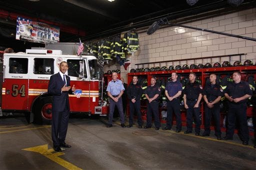 President Barack Obama meets with firefighters and first responders at Engine 54, Ladder 4, Battalion 9 before visiting the National Sept. 11 Memorial at Ground Zero in New York, Thursday, May 5, 2011
