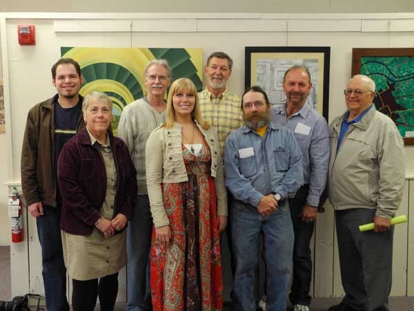 Maple City Fine Arts Exhibition winners include, front row, from left:?kathy nelson, Ellie DeMay and Paul Terpening. Back row, from left: Brian Murphy, Dan Spahn, Ron Pettit, Steve Hancock and James Dayton.