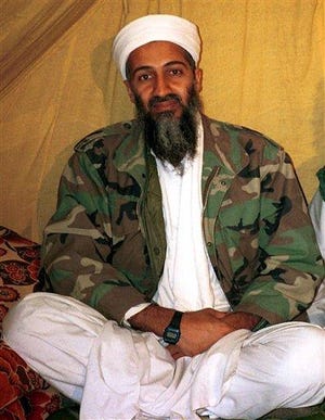 FILE -This undated file photo, shows Osama bin Laden. Americans are expected to get a glimpse of Osama bin Laden's daily life with the disclosure of home videos showing him strolling around his secret compound, along with propaganda tapes that have never been made public.