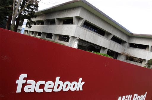 A Jan. 3, 2001 file photo shows the Facebook headquarters in Palo Alto, Calif. According to a study released Monday, May 8, 2011, by the Pew Research Center's Project for Excellence in Journalism, Facebook is playing a role in what news gets read online.