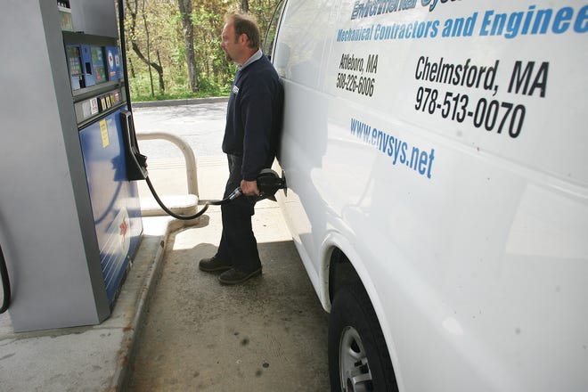 Bellingham resident Ken Vanveghten fills his company's van up for $4.09 per gallon at the Mobil station on the corner of Hartford Avenue and North Main Street in Bellingham on Thursday. Vanveghten uses his company's credit card to purchase the gas, but says he isn't driving as far these days in his own vehicle after the steep increase in gas prices.