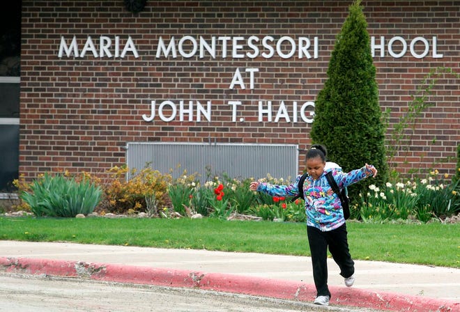A student leaves Maria Montessori School in Rockford on Monday, May 9, 2011.