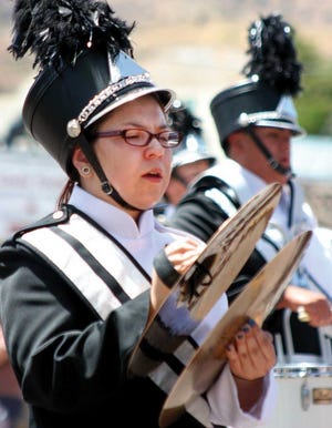Pueblo South High School won first place in the Canon City Music and Blossom Festival class 3A parade marching competition Saturday and also garnered outstanding percussion and drum major honors.