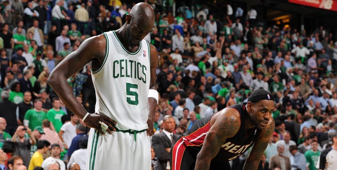 The Celtics' Kevin Garnett, left, finished with just 10 rebounds and seven points on 1-for-10 shooting in Monday night's overtime loss to Miami. LeBron James led all scorers with 20 points for the Heat, who take a 3-1 series lead back home to Miami on Wednesday.