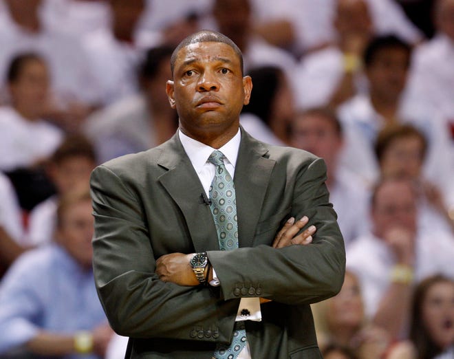Boston Celtics' coach Doc Rivers watches the final minutes of the second half of Game 5 of a second-round NBA playoff basketball series in Miami, Wednesday, May 11, 2011. The Heat won 97-87 to advance to the Eastern Conference finals. (AP Photo/J Pat Carter)