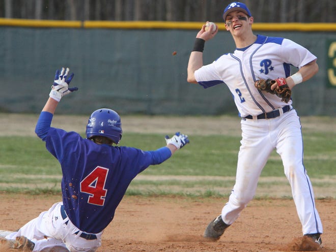 Polk County's Roberto Taft gets West Henderson's Cameron Brogden out at second as he turns a double play during a game earlier this season. Both teams will have first-round home games on Friday night.