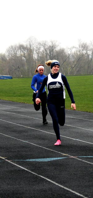Molly Smith won the 100-meter dash, 200-m dash and 300-m hurdles during a triangular meet at Bureau Valley Monday, April 25.