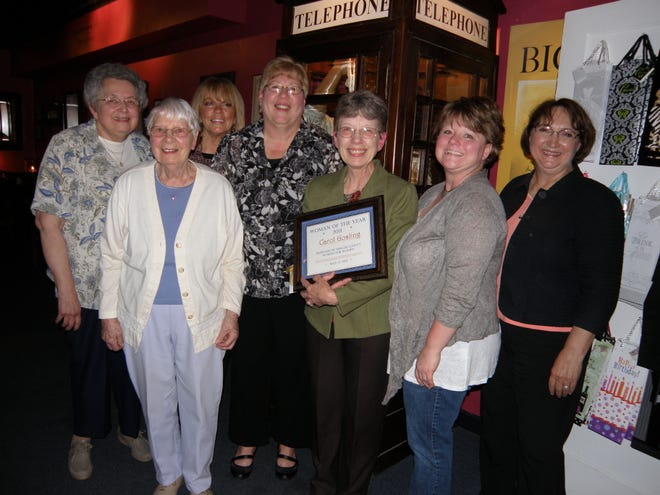 From left are Jean Kinnamon, Agnes Koresko (Nancy's mother), Judy Redlinger, Kim Weese, Woman of the Year Nancy Watkins, daughter Deb McGrath and Diana Vance.