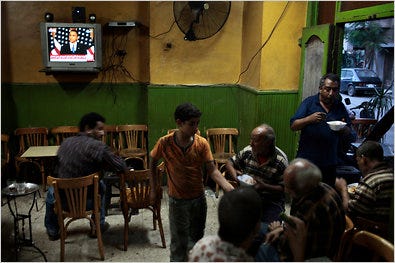 Patrons at a cafe in Cairo on Thursday as President Obama spoke. About 10 minutes into the speech, the channel was changed to one showing an action movie.