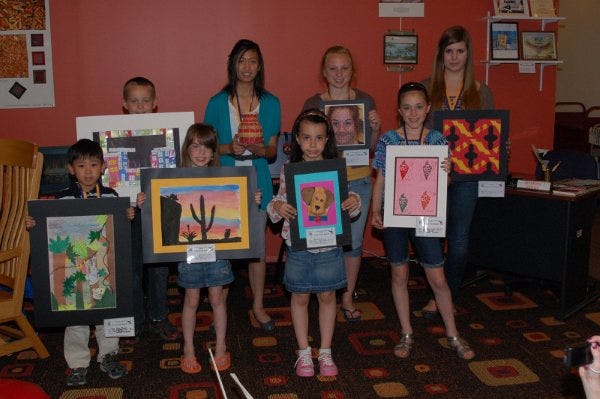 Submitted Photo 
The Jefferson Arts Committee recently recognized the May 2011 Student Artists of the Month. Front row, from left,  Nathan Do, E.T. Briggs School first-grader; Ellis Gill, White Rock School third-grader; Grace Reed, Cozy Lake School second-grader; and Alexa Cohen, Arthur Stanlick School fifth-grader. Back row, from left, Logan Verinder, E.T. Briggs School second-grader; Vina Articona, Jefferson Township High School freshman; Alexa Prezwodek, Jefferson Township High School sophomore; and Jacqueline Evers, Jefferson Township High School sophomore.