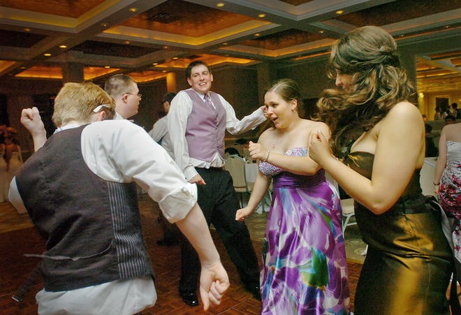 From left, Hanover High School students Ben Hyland, Geoff Loomis, Charlie Morse, Julie MacDonald and Melinda Pontes dance at the senior prom in Dorchester on Friday, May 13, 2011.
