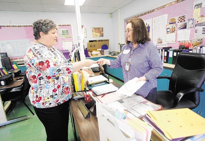 The Valley Central district’s endowment fund – which will enrich education – is under way, and the high school held a dress-down day to raise money. Paula Balz, left, president of the Valley Central Education Foundation, and teacher Diane Ruggles helped organize the event.