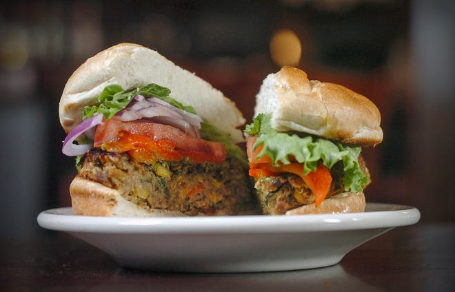 A homemade veggie burger is served at Christopher's Restaurant, in Cambridge, Tuesday, May 3, 2011.