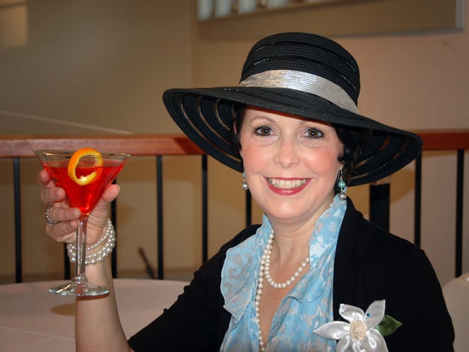 Actress Eileen Fendler, who plays nightclub singer Reno Sweeney in Cotuit Center for the Arts' production of "Anything Goes," holds the Reno Sweeney-tini created for the show.