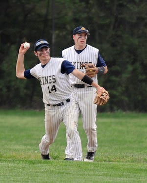 East Bridgewater's Pat Dempsey (14) throws to first while teammate James Sullivan backs him up during the Vikings' 11-0 victory over Harwich on Tuesday.