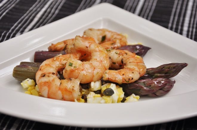 The combination of pink shrimp and purple asparagus makes a lovely salad.