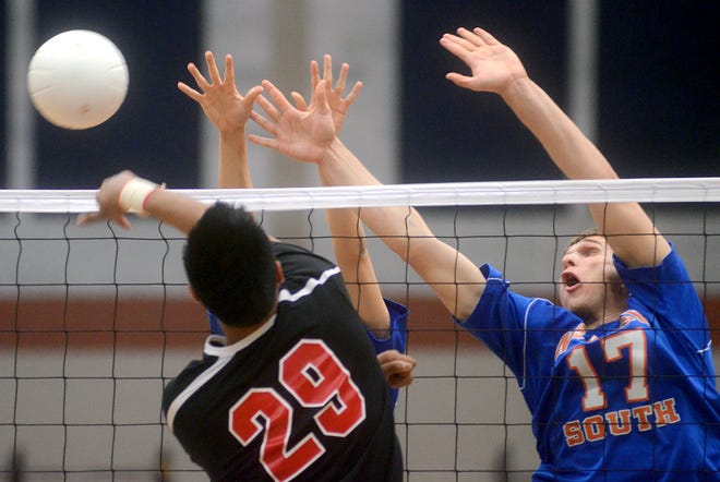 Newton South senior Josh Horenstein tries for a block during the Division 1 South boys volleyball quarterfinals against Durfee on Monday.