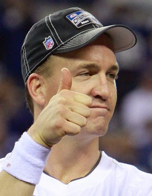 Indianapolis Colts quarterback Peyton Manning  gives thumbs-up after the Colts' 30-17 win over the New York Jets.