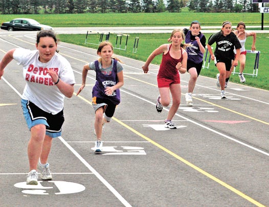 Sixth graders from Pickford, DeTour, and Cedarville schools gathered in Pickford on Wednesday to participate in a friendly track and field competition. The meet also gave students a chance to try out different events. Here, six lucky girls take on the 200-m dash.