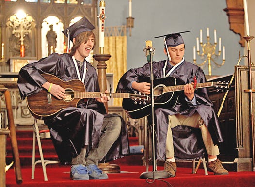 Mitch Goetz and Travis Theel, seniors at Sault Area High School, played and sang “Hallelujah” at the Class of 2011 Baccalaureate at St. James Episcopal Church on Thursday evening in Sault Ste. Marie. Most graduation ceremonies will be held this weekend across the Eastern Upper Peninsula.