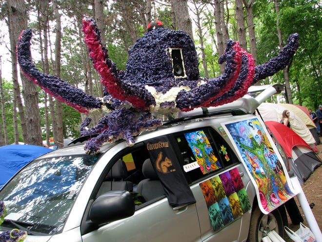A purple octopus beckons curiosity-seekers to the van carrying an Indiana band called The Main Squeeze. the eight-tentacled mascot stood out as one of the most unusual sights at Summer Camp.