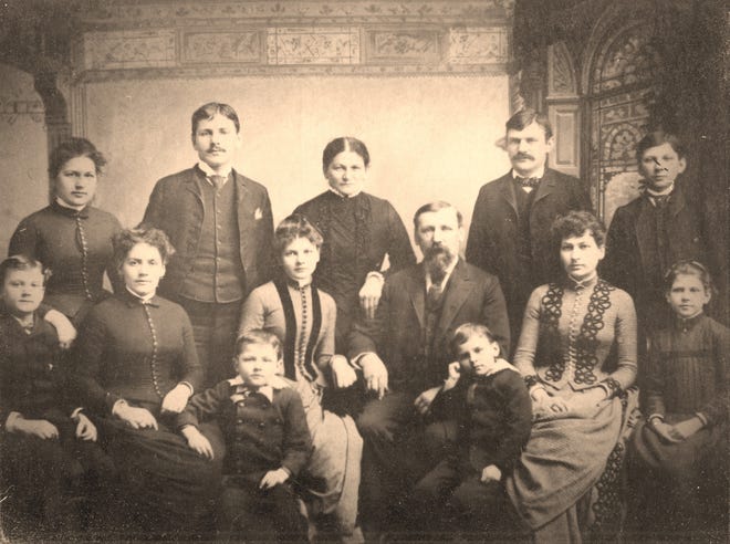 Heinrich Scheible, who came to the United States from Bavaria in Germany as a young man, and his family pose in Rochester, N.Y., in 1882. Scheible, seated in the middle row, third from the right, with a beard, is the great-great-grandfather of reporter Sue Scheible. His wife, Dorothea Ellwanger Scheible, is next to him with her arm on his shoulder.
The other family members, as labeled by Sue Scheible's father, born in 1912:
Back Row, l to R: Sarah, George, Grandma Ellwanger, Henry, Carl
Middle Row: Neil, Mary, Ida, Grandpa Scheible, Louise, Carrie
Front Row: Walter, Alfred F.