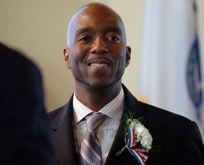 Councilor-at-large Jass Stewart smiles during inauguration ceremonies at City Hall on Monday morning.