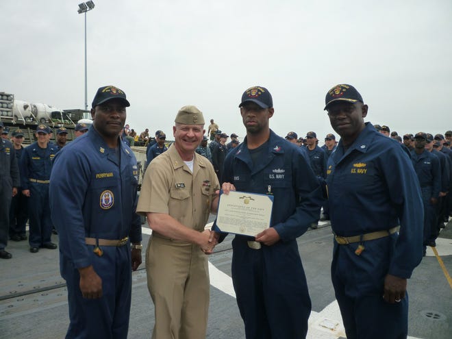 Master Chief Petty Officer of the Navy Rick West with Cmdr. Darryl Brown, Commanding Officer USS Robert G. Bradley, Cryptologic Technician Technical 3rd Class Arthur Harris, and Command Master Chief Antonio Perryman.