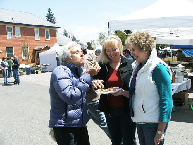 "Fabulous, so good," is how Linda Chitwood of Mount Shasta describes a sampling of portobello paninis, offered by Jackie Hagerty of the Mt. Shasta Kiwanis during the 7th Annual McCloud Mushroom, Wine and Music Faire. The weekend event was deemed a success by organizers, despite the threat of rain Saturday.