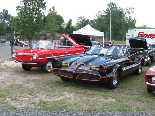 A replica Batmobile [r] and classic Amphicar were some of the cars at the Memorial Day weekend show at Wheeler Power Products.