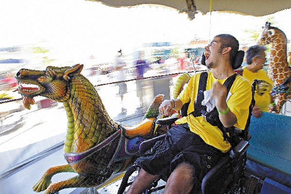 Fabian Mendoza rides a carousel at Morgan’s Wonderland in San Antonio, Texas. Every detail of the 25-acre, $34-million park caters to people with physical or mental disabilities. The carousel allows children and adults of different abilities to experience a merry-go-round.