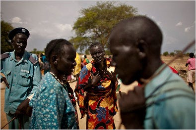 A displaced southern Sudanese woman from the border town of Abyei pleaded for more food at a makeshift refugee camp in Turalei, southern Sudan, on June 1.