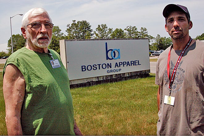 Thomas Fay, left, and Marco Pereira, president of UnitedHere Local 2001, say they’ve been notified by Boston Apparel Group that all employees at the Taunton site are to be laid off beginning later this month.