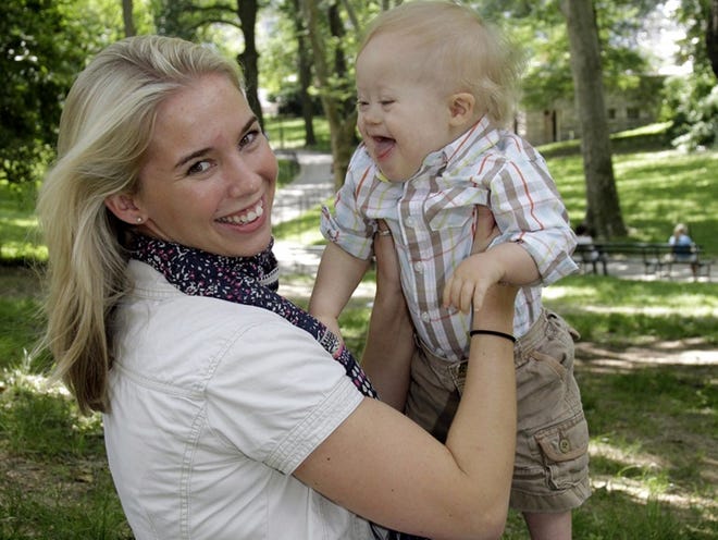 Erin Witkowski of Port Jervis, N.Y., and her son play in New York's Central Park. Witkowski took a test to see if the baby she was carrying had Down syndrome. The test came back positive and she refused the suggestion of abortion.