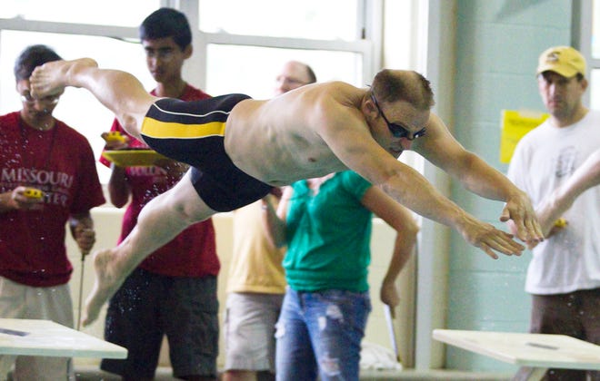 Eureka’s Eric Sherron competes in the 50-meter freestyle in the Show-Me State Games at Hickman pool. He has continued to compete after having a kidney transplant in 2005.