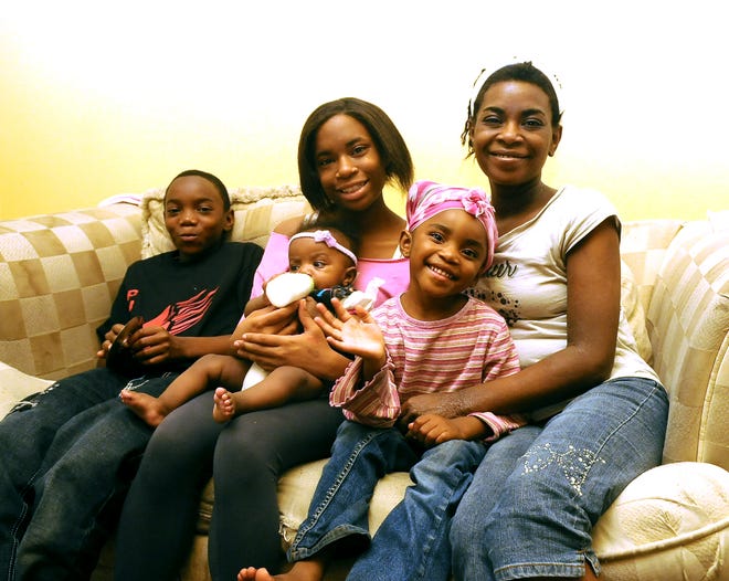 From left, Michael Ellis, Alexis Smith, Truly Smith, D'Angel Smith and Talisha Smith are all members of one family that benefited from Women Who Care. Women Who Care donated money to Good Samaritan Ministries that helped this family. June 8th 2011