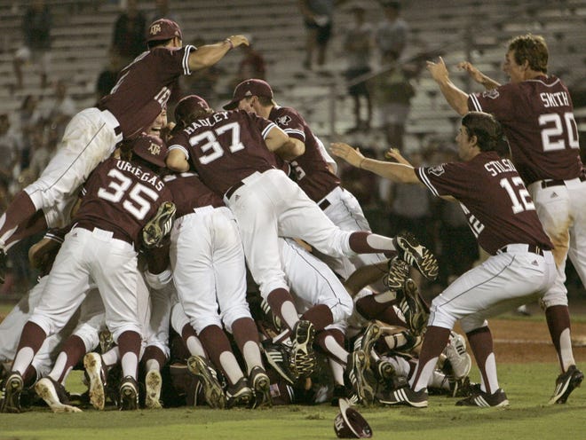 Texas A&M's players celebrate their 11-2 victory over Florida State after an NCAA college baseball tournament Super Regional game on Monday, June 13, 2011, in Tallahassee, Fla. (AP Photo/Steve Cannon)