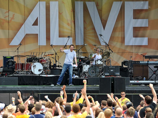 Christian rapper John Reuben entertains a large crowd at last years Alive Christian Music Festival at Atwood Lake Park.