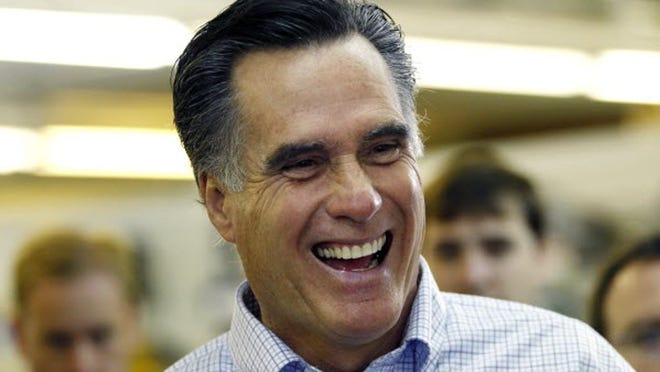 Republican presidential hopeful, former Mass. Gov. Mitt Romney laughs during a campaign stop at a hardware store in Derry, N.H., Tuesday June 14, 2011. Many of the GOP candidates took advantage of campaigning in the state after Monday evening's Republican presidential debate.