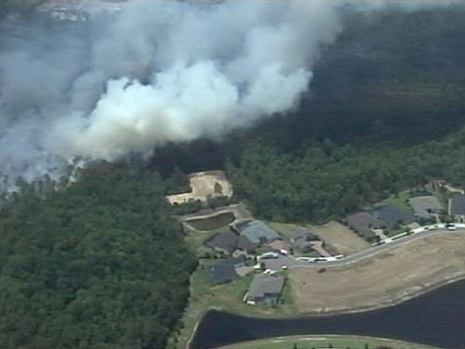 An aerial view of one of several fires that erupted in the Nease High School and Nocatee areas of northern St. Johns County on Thursday.