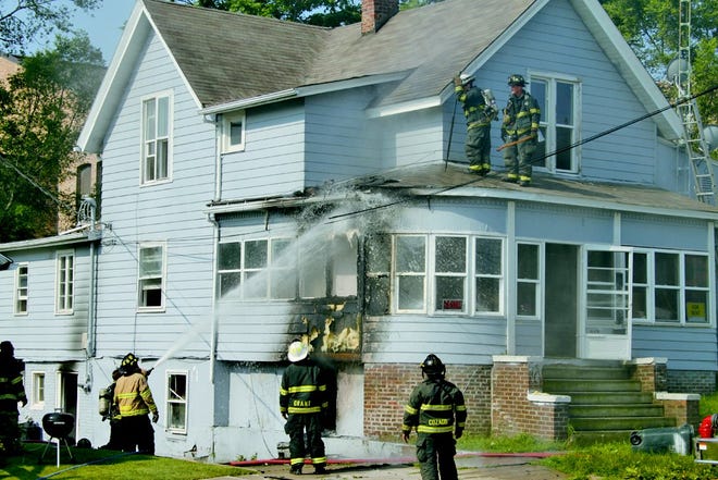 Monmouth Firefighters battle the recent apartment fire.