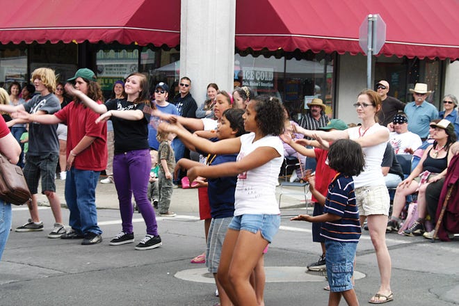 A group performs the “Macarena” during a street dance held during Gold Rush Days 2010. This year’s street dance will be from 4-7 p.m. with the Blue Relish Band. Other entertainment that will fill the stage in front of the Yreka Chamber of Commerce throughout the day will include cowboy poets, belly dancers, bands and contests.