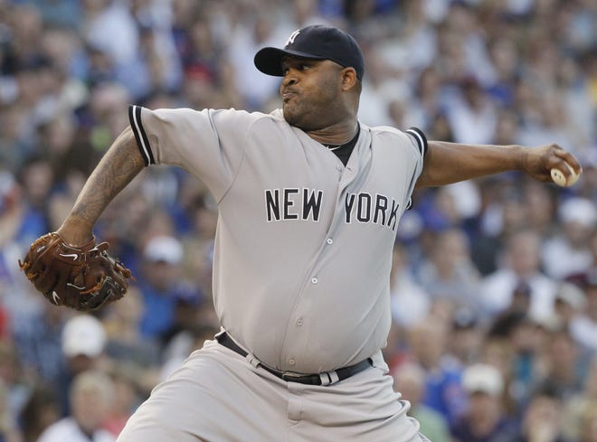 New York Yankees starter CC Sabathia throws during the first inning of an interleague baseball game against the Chicago Cubs in Chicago, Sunday, June 19, 2011.