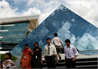 Employees in 2008 at Infosys in Bangalore, India. The company's visa practices are under scrutiny.