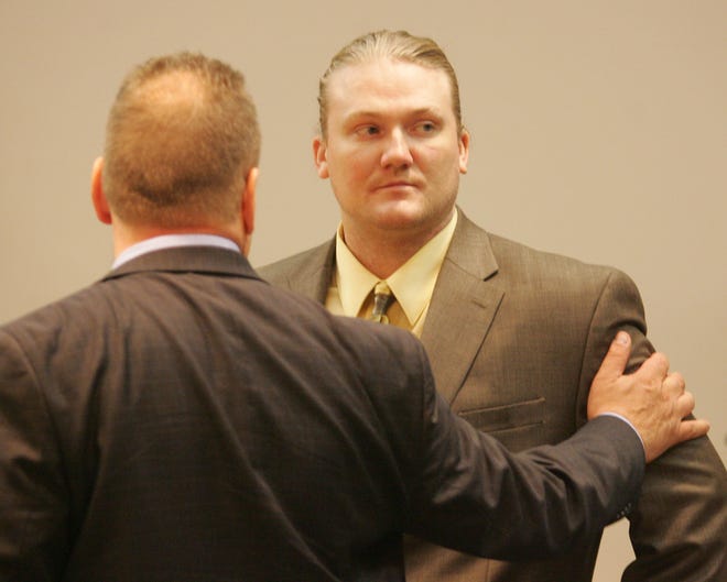 Photo by Daniel Freel/New Jersey Herald 
 
Jacob Gentry, right, is consoled by his attorney Thomas Militano as he looks back at his parents after he was found guilty of aggravated manslaughter and endangering an injured victim in Sussex County Superior Court Thursday, June 23, 2011. Gentry was on trial for the 2008 fatal beating of David Haulmark, 36, outside Vernon's Legends Resort.