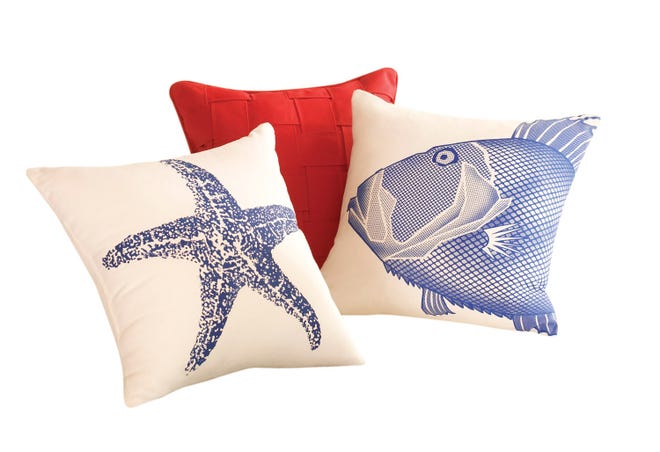 This product image courtesy of Homegoods shows Sea Life pillows. This summer, retailers are offering decor that evokes the sand and surf, but with a sophistication that makes it work as a seasonal accent to most rooms no matter what your decorating style.