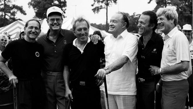 Willie Nelson, Darrell Royal, Andy Williams , Bob Hope, Robert Sakowitz and D. Sanders at a golf tournament in 1988.