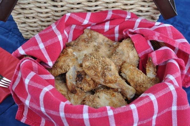 A buttermilk soak and a dip in whole wheat flour and sesame
seeds give this chicken a nice brown crust, without the mess and
calories of frying.