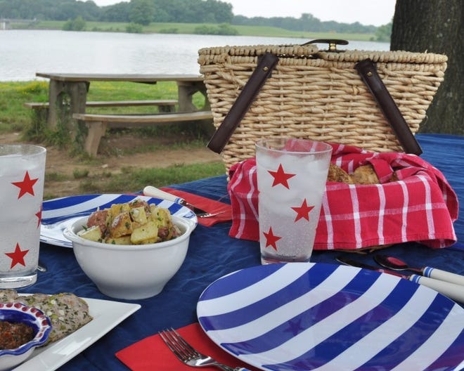 Red, white and blue dishes and accessories add to the fun of a
Fourth of July picnic.